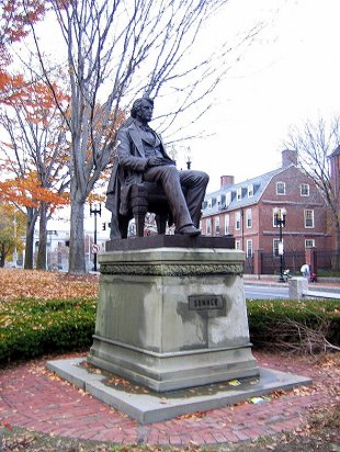 Harvard Square Cambridge Common Charles Sumner Statue-To honor Charles Sumner, who was beat unconscious by Preston Brooks's cane on the Senate floor to his relentless devotion to end Slave Power. (medium sized photo)